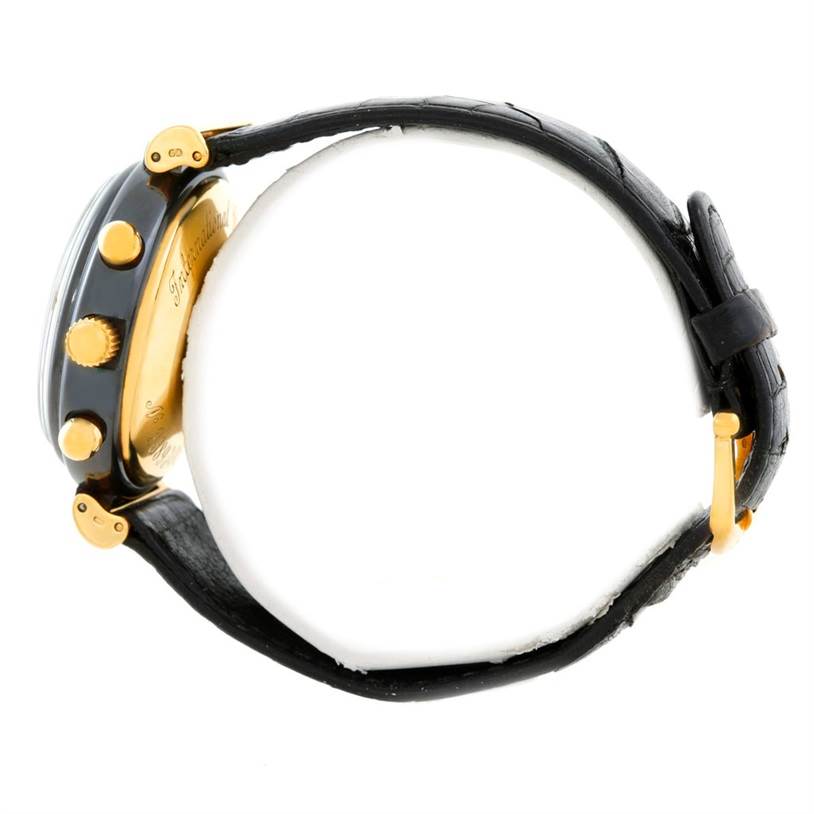 The image shows a side view of the IWC Da Vinci 3755 Men's Yellow Gold White Dial 3755 Men's Yellow Gold White Dial watch, highlighting the crown, push buttons, and black leather strap.