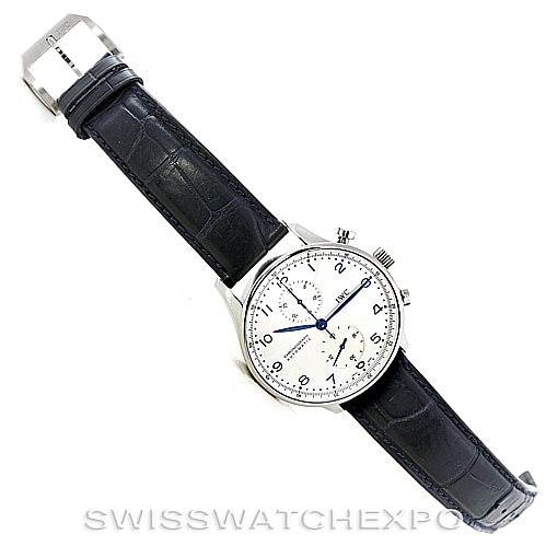 The image shows a top-down view of an IWC Portuguese IW371417 Men
s Stainless Steel Silver Dial IW371417 Men
s Stainless Steel Silver Dial model watch, displaying the dial, hands, case, and black leather strap.