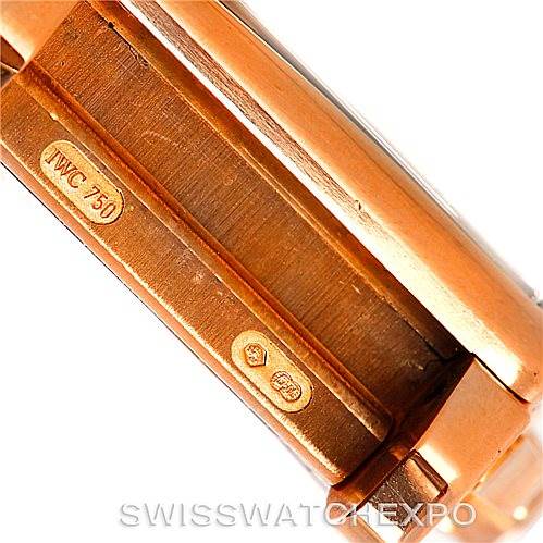 This image shows a close-up of the side of the case of an IWC Da Vinci IW376205 Men's Rose Gold Black Dial IW376205 Men's Rose Gold Black Dial watch, highlighting the markings and metal details.