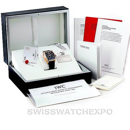 This image shows the IWC Da Vinci IW376205 Men's Rose Gold Black Dial IW376205 Men's Rose Gold Black Dial watch, along with its open case, manuals, and warranty cards, viewed from an angled top-down perspective.