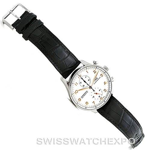 This image shows an overhead view of the IWC Portuguese IW371445 Men's Stainless Steel Silver Dial IW371445 Men's Stainless Steel Silver Dial watch, displaying the face, strap, and buckle.