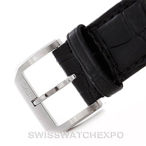 This image shows a close-up of the buckle and part of the black leather strap of an IWC Portuguese IW371445 Men's Stainless Steel Silver Dial IW371445 Men's Stainless Steel Silver Dial watch.