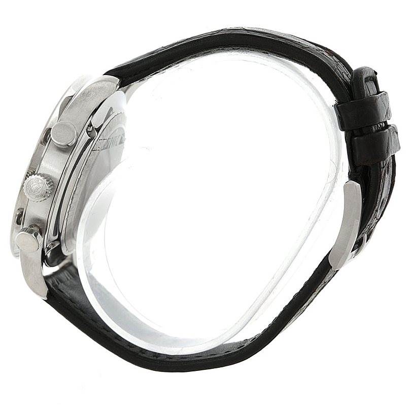 The image shows a side view of the IWC Portuguese IW371438 Men
s Stainless Steel Black Dial IW371438 Men
s Stainless Steel Black Dial watch, focusing on its stainless steel case, pushers, crown, and black leather strap.