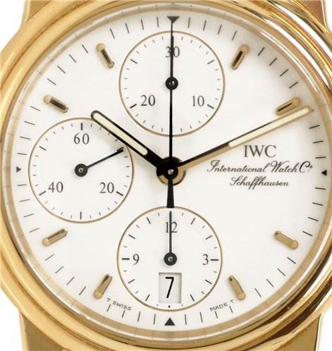 The image shows a close-up of the IWC Vintage 3703 Men's Yellow Gold White Dial 3703 Men's Yellow Gold White Dial watch dial with three subdials and a date window.