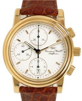 This image shows a front view of a Vintage IWC chronograph watch with a gold casing and a brown leather strap.