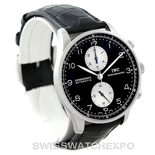The image shows a side-angle view of the IWC Portuguese IW371404 Men
s Stainless Steel Black Dial IW371404 Men
s Stainless Steel Black Dial watch, featuring its black dial, two subdials, and black leather strap.