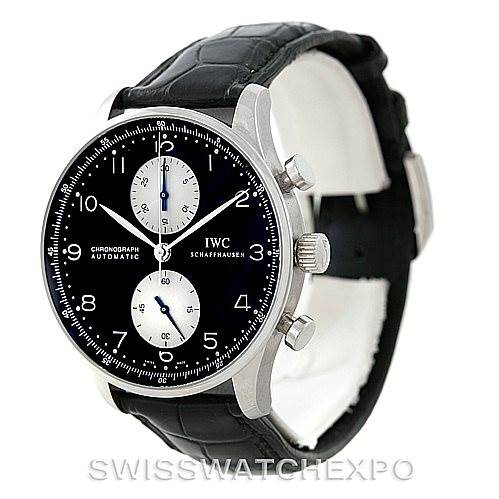 The image shows an angled view of the IWC Portuguese IW371404 Men
s Stainless Steel Black Dial IW371404 Men
s Stainless Steel Black Dial Chronograph with a black dial and leather strap.
