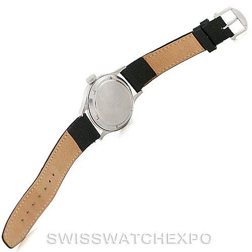 This IWC Pilot MARK XI Men
s Stainless Steel Black Dial MARK XI Men
s Stainless Steel Black Dial model watch is shown from the back, emphasizing its case, crown, and open strap with buckle.