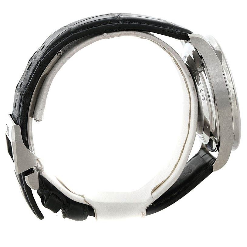 The image shows a side view of the IWC Portuguese IW371446 Men
s Stainless Steel Silver Dial IW371446 Men
s Stainless Steel Silver Dial model watch, highlighting its black leather strap and stainless steel case.