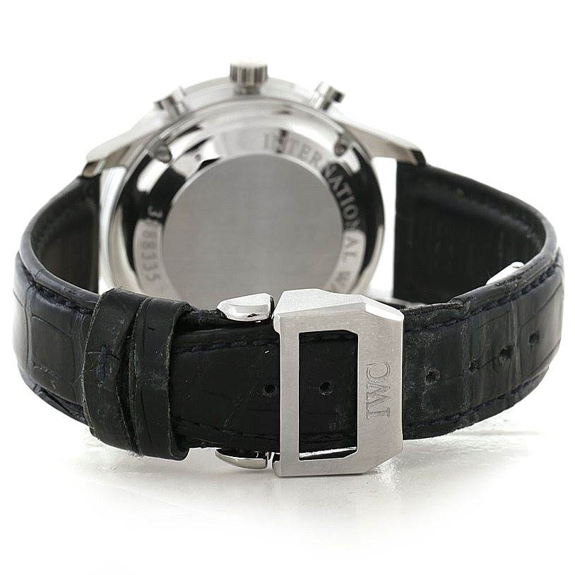 The image shows the back view of an IWC Portuguese IW371446 Men
s Stainless Steel Silver Dial IW371446 Men
s Stainless Steel Silver Dial model watch, focusing on the caseback, leather strap, and buckle.