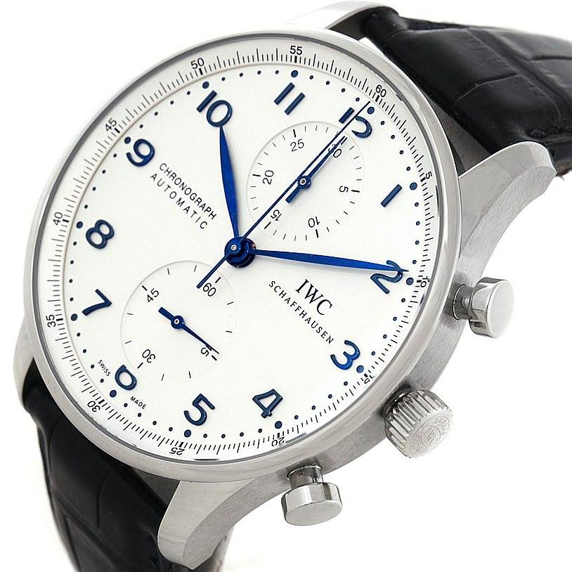 This image shows the face, crown, and pushers of the IWC Portuguese IW371446 Men
s Stainless Steel Silver Dial IW371446 Men
s Stainless Steel Silver Dial Chronograph watch from an angled side view.
