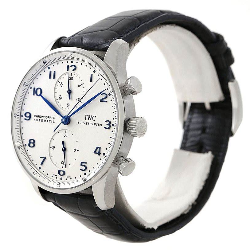 This image shows a side angle of the IWC Portuguese IW371417 Men's Stainless Steel Silver Dial IW371417 Men's Stainless Steel Silver Dial chronograph watch, displaying its dial, case, crown, and leather strap.