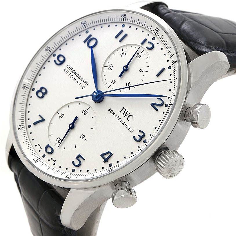 The image shows the dial, crown, and pushers of an IWC Portuguese IW371417 Men's Stainless Steel Silver Dial IW371417 Men's Stainless Steel Silver Dial Chronograph watch at an angled side view.