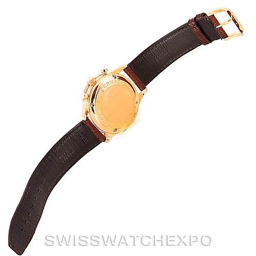 The image shows the back of an IWC Portuguese IW371415 Men's Rose Gold Black Dial IW371415 Men's Rose Gold Black Dial model watch with a visible brown leather strap and gold clasp.