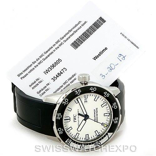 The image shows an IWC Aquatimer IW356805 Men's Stainless Steel White Dial IW356805 Men's Stainless Steel White Dial watch at an angle that highlights the dial and bezel, with warranty and service cards in the background.
