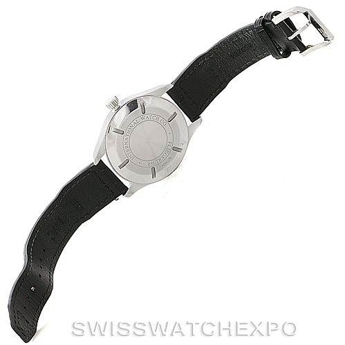 The image shows the back case and leather strap of an IWC Pilot IW326501 Men's Stainless Steel Black Dial IW326501 Men's Stainless Steel Black Dial model watch, viewed from the rear angle.