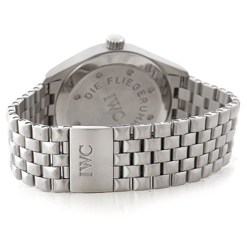 The image shows the back view of an IWC Pilot IW325102 Men's Stainless Steel Black Dial IW325102 Men's Stainless Steel Black Dial model watch, highlighting its stainless steel bracelet and clasp.