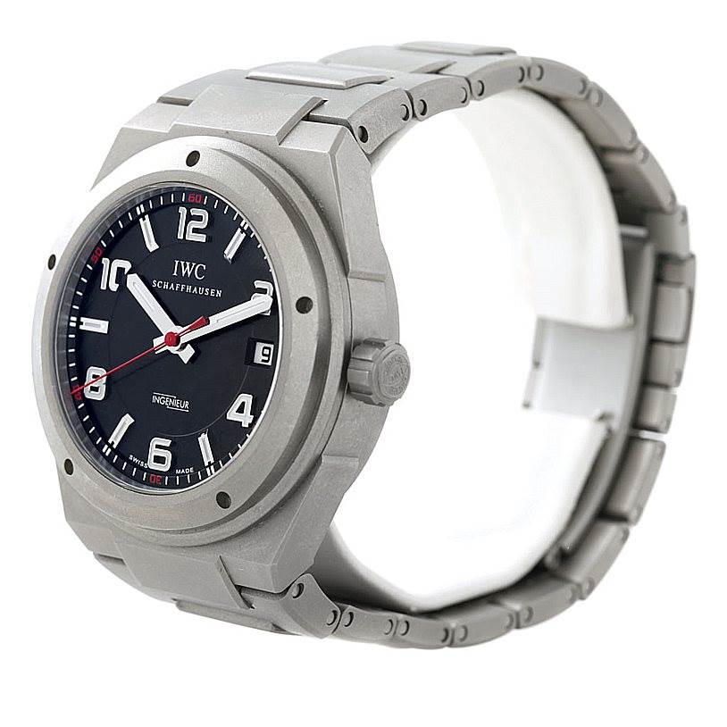 The IWC Ingenieur IW322703 Men's Titanium Black Dial IW322703 Men's Titanium Black Dial watch is shown from a three-quarter angle, highlighting the watch face, bezel, crown, and bracelet.