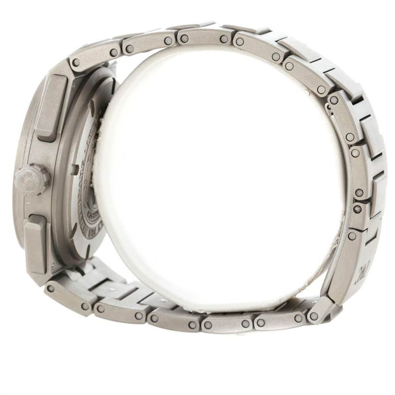 The image shows a side view of the IWC Ingenieur IW372503 Men's Titanium Black Dial IW372503 Men's Titanium Black Dial watch, highlighting the case, crown, and metal bracelet.