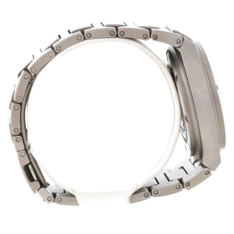 The image shows a side view of the IWC Ingenieur IW372503 Men's Titanium Black Dial IW372503 Men's Titanium Black Dial watch, highlighting its bracelet and case.