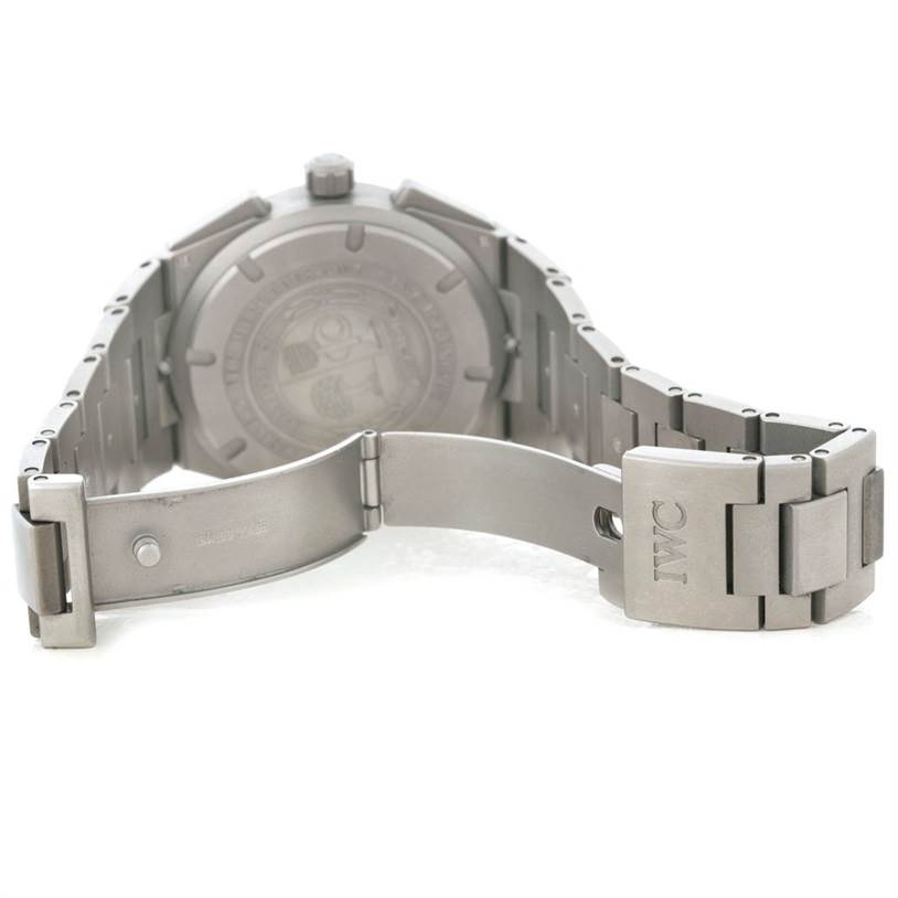 This image shows the open stainless steel bracelet and engraved case back of the IWC Ingenieur IW372503 Men's Titanium Black Dial IW372503 Men's Titanium Black Dial watch from a rear angle.
