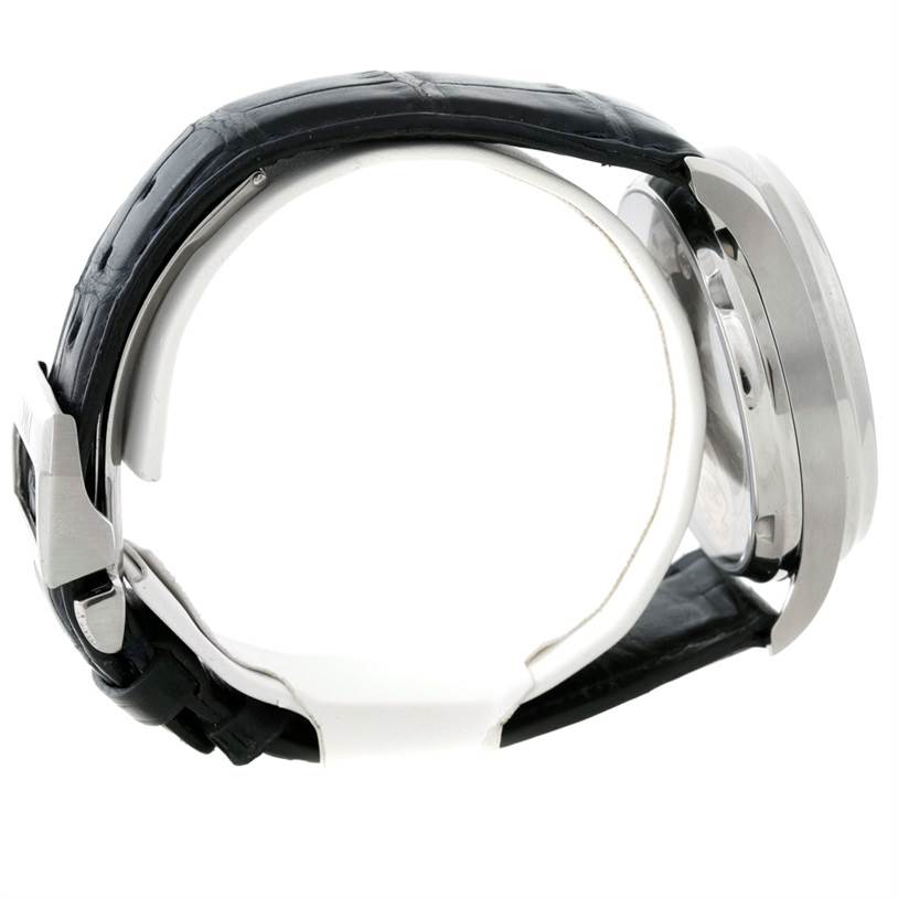 The image shows a side profile of an IWC Portuguese IW500107 Men's Stainless Steel Silver Dial IW500107 Men's Stainless Steel Silver Dial model watch highlighting its black leather strap and stainless steel case.