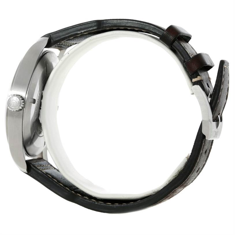 This image shows a side view of an IWC Pilot IW326506 Men's Stainless Steel Blue Dial IW326506 Men's Stainless Steel Blue Dial model watch, displaying the case, crown, and leather strap with buckle.