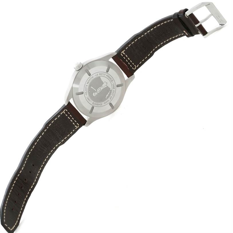 This image shows the back view of an IWC Pilot IW326506 Men's Stainless Steel Blue Dial IW326506 Men's Stainless Steel Blue Dial model watch with its leather strap and clasp visible.