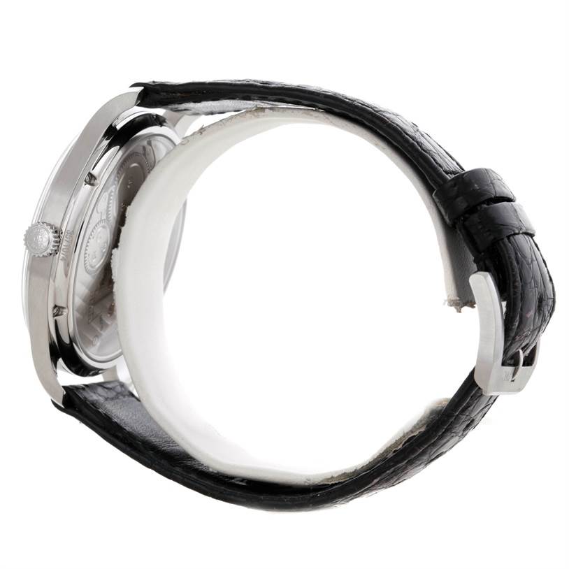 The image shows a side view of an IWC Portuguese IW545405 Men's Stainless Steel Silver Dial IW545405 Men's Stainless Steel Silver Dial model watch, highlighting the case, crown, and leather strap with a buckle.