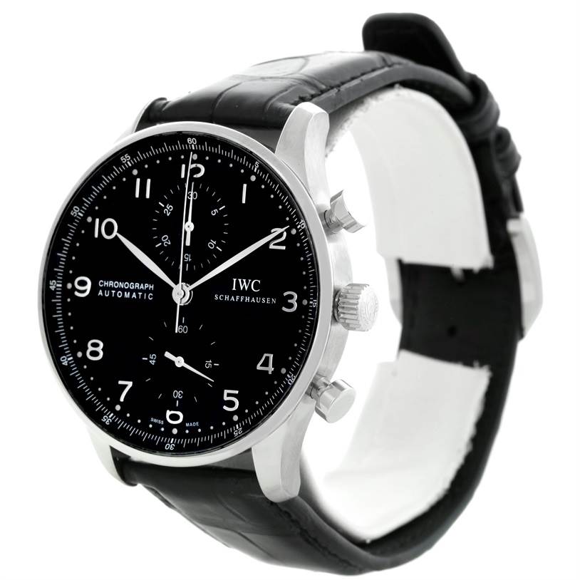 The image shows a side angle of an IWC Portuguese IW371447 Men's Stainless Steel Black Dial IW371447 Men's Stainless Steel Black Dial Chronograph Automatic watch, highlighting the black dial, case, crown, and leather strap.