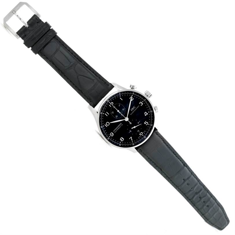 The image shows a full frontal view of an IWC Portuguese IW371447 Men's Stainless Steel Black Dial IW371447 Men's Stainless Steel Black Dial model watch, featuring the dial, case, and black leather strap.