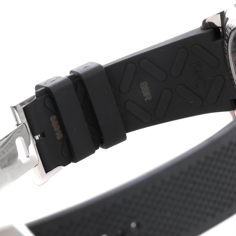 This image shows the strap, clasp, and part of the case back of an IWC Portuguese IW390210 Men's Stainless Steel Black Dial IW390210 Men's Stainless Steel Black Dial model watch at an angle.