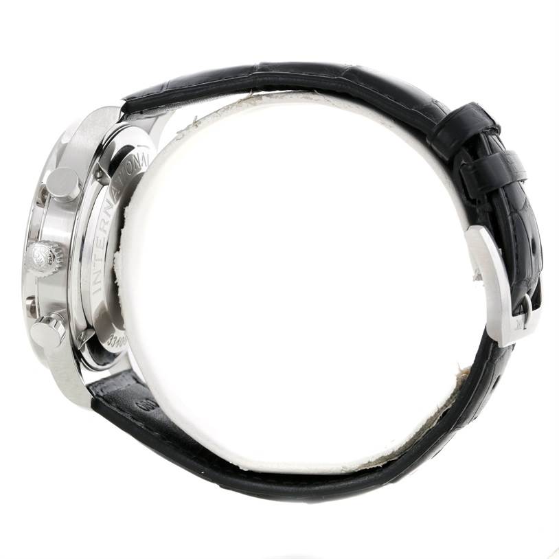 The image shows a side view of an IWC Portuguese IW371445 Men's Stainless Steel Silver Dial IW371445 Men's Stainless Steel Silver Dial model watch, highlighting its case, crown, pushers, and leather strap.