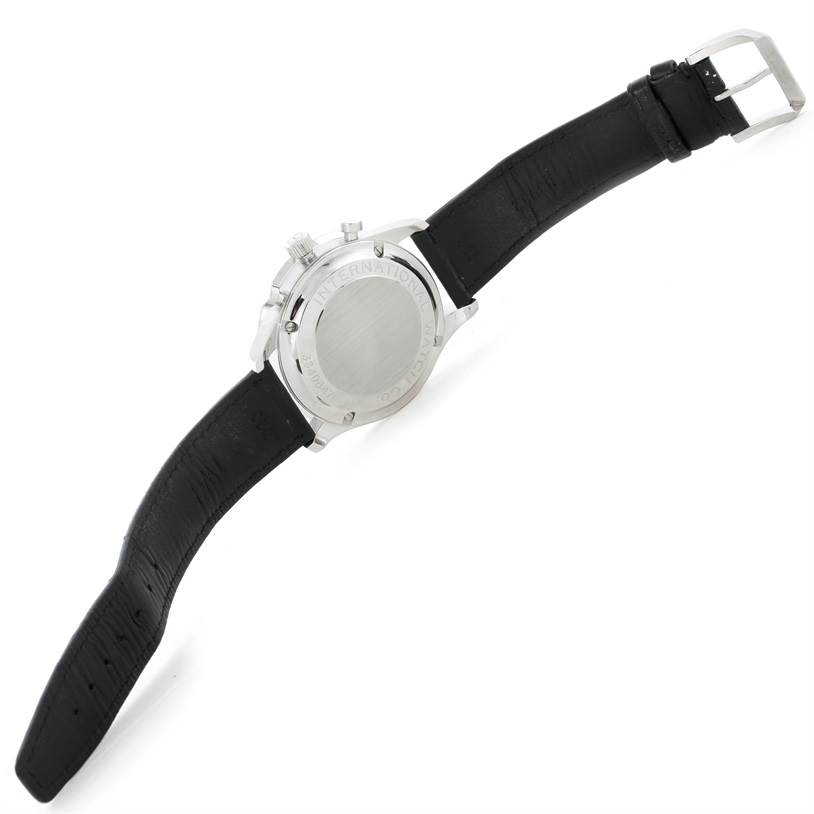 The image shows the back angle of the IWC Portuguese IW371445 Men's Stainless Steel Silver Dial IW371445 Men's Stainless Steel Silver Dial model watch, highlighting the case back, crown, and black leather strap.