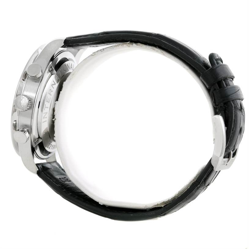 Side view of the IWC Portuguese IW371438 Men's Stainless Steel Black Dial IW371438 Men's Stainless Steel Black Dial watch showing the case, buttons, and black leather strap with a buckle.