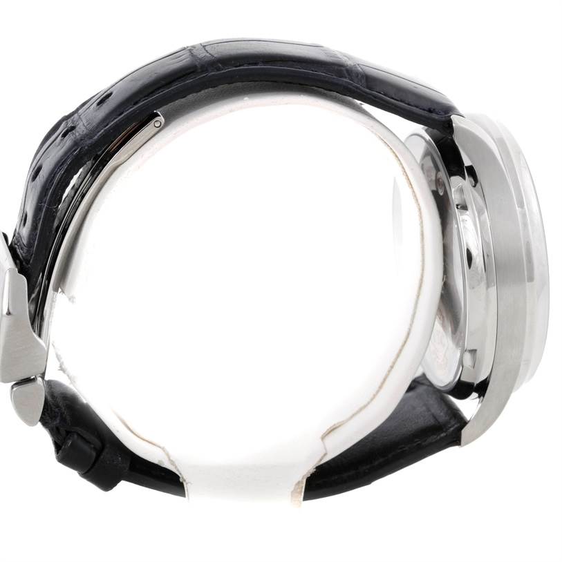 This image shows a side view of an IWC Portuguese IW500107 Men's Stainless Steel Silver Dial IW500107 Men's Stainless Steel Silver Dial model watch, highlighting the case and leather strap.