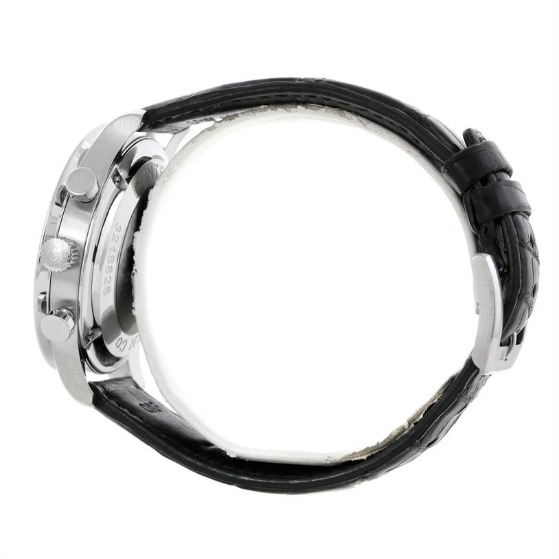 This side view of the IWC Portuguese IW371438 Men's Stainless Steel Black Dial IW371438 Men's Stainless Steel Black Dial watch shows the case, crown, pushers, and black leather strap.