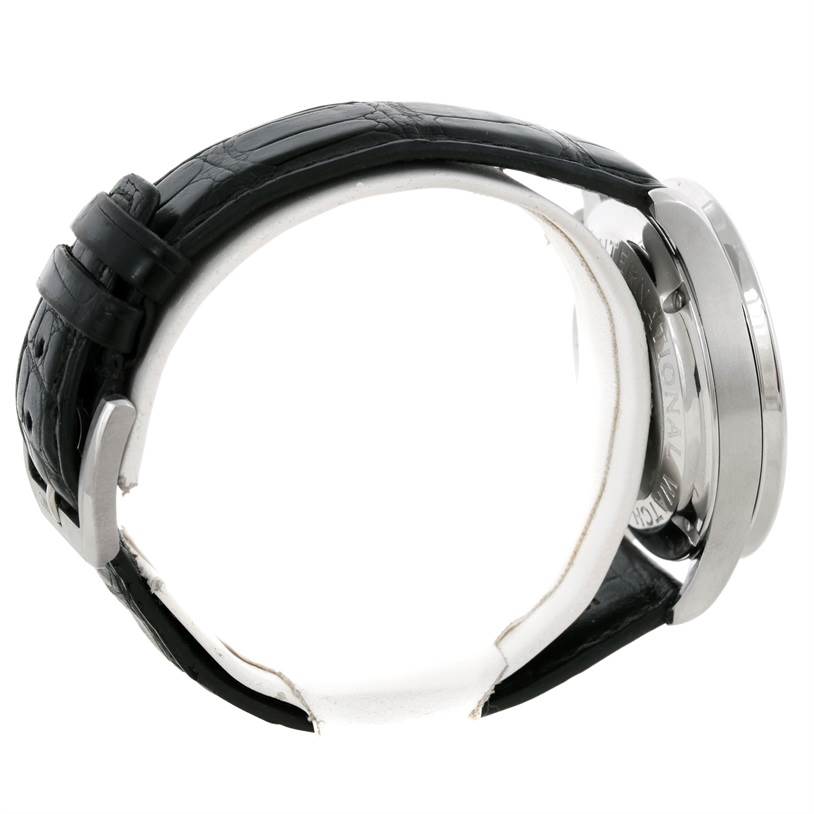 The image shows a side view of an IWC Portuguese IW371438 Men's Stainless Steel Black Dial IW371438 Men's Stainless Steel Black Dial model watch, highlighting its black leather strap and metallic case.