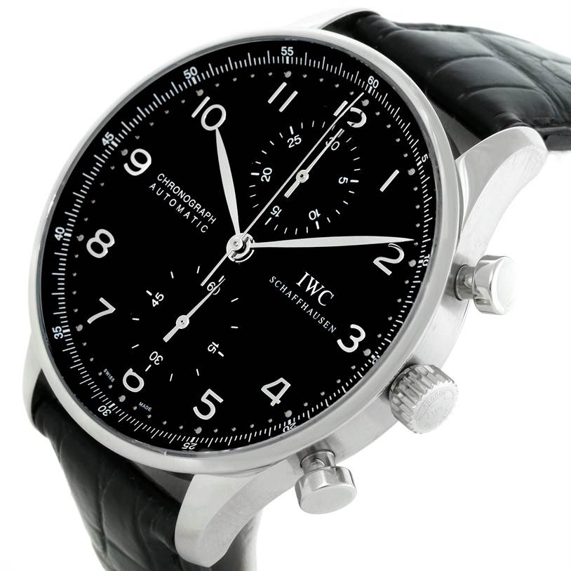 This image shows a close-up view of an IWC Portuguese IW371438 Men's Stainless Steel Black Dial IW371438 Men's Stainless Steel Black Dial Chronograph watch, highlighting the dial, crown, pushers, and part of the strap.