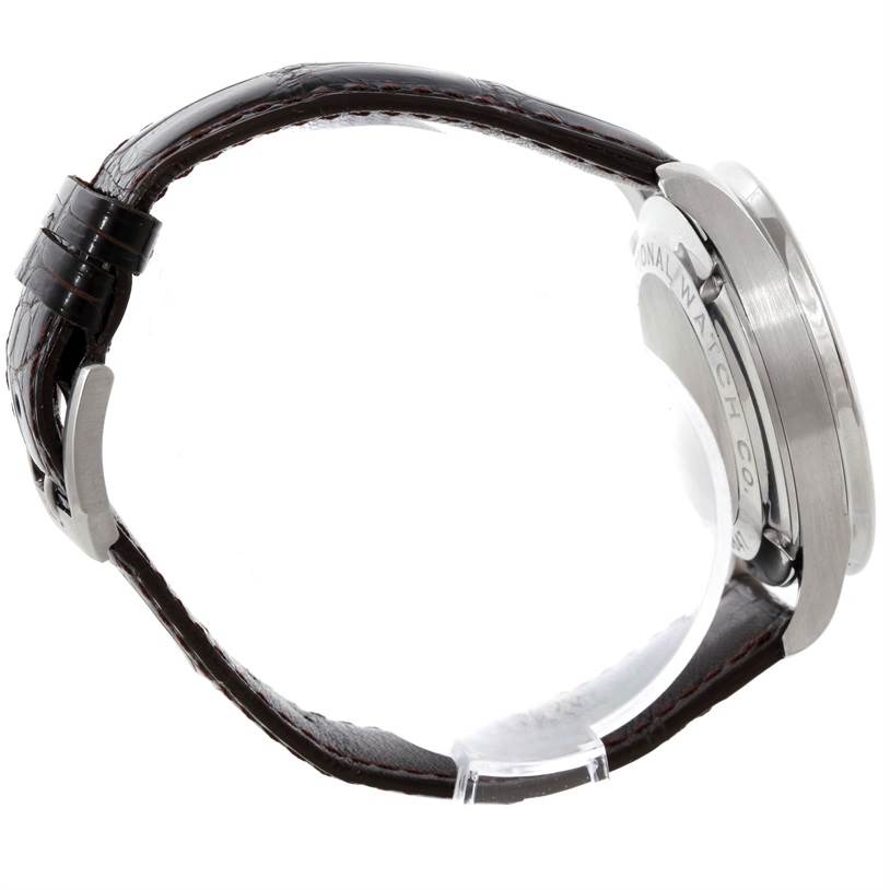 The image shows a side view of an IWC Portuguese IW371438 Men's Stainless Steel Black Dial IW371438 Men's Stainless Steel Black Dial model watch, highlighting its leather strap and stainless steel case.