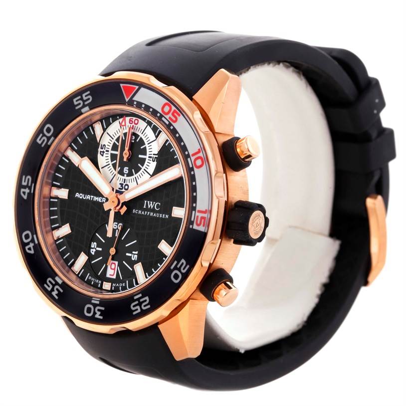 The IWC Aquatimer IW376903 Men's Rose Gold Black Dial IW376903 Men's Rose Gold Black Dial watch is shown from a front angle, highlighting its dial, bezel, pushers, and black strap.