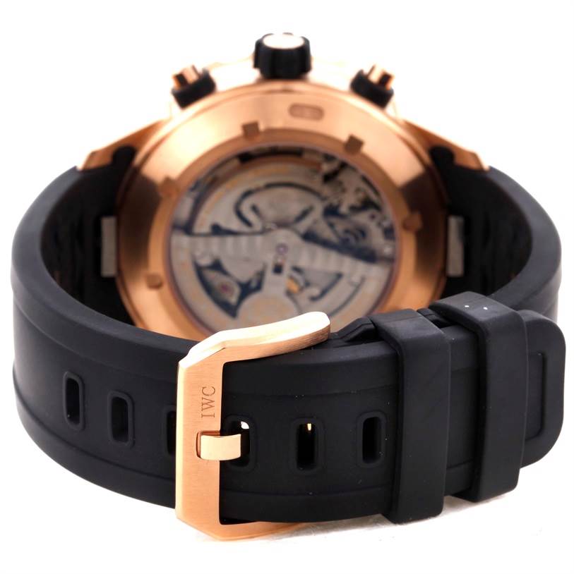 This image shows the back view of an IWC Aquatimer IW376903 Men's Rose Gold Black Dial IW376903 Men's Rose Gold Black Dial watch, displaying its buckle and rubber strap.