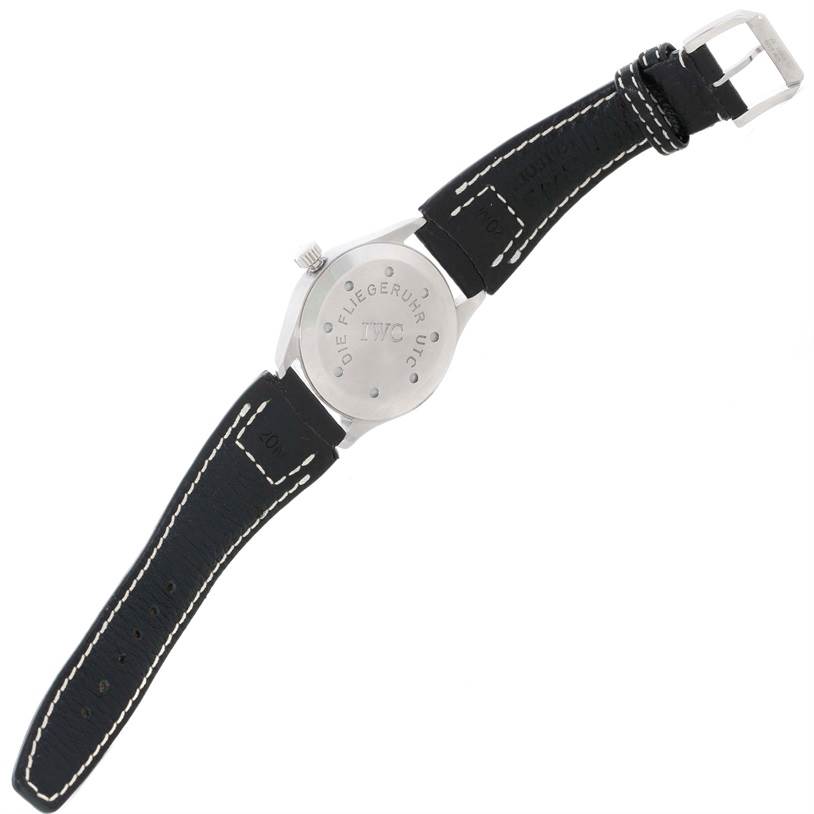 The image shows the back side of an IWC Pilot IW325101 Men's Stainless Steel Black Dial IW325101 Men's Stainless Steel Black Dial model watch, including the case back, lugs, crown, strap, and buckle.