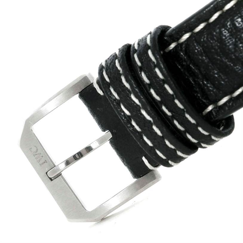 The image shows an up-close view of the buckle and strap of an IWC Pilot IW325101 Men's Stainless Steel Black Dial IW325101 Men's Stainless Steel Black Dial model watch.