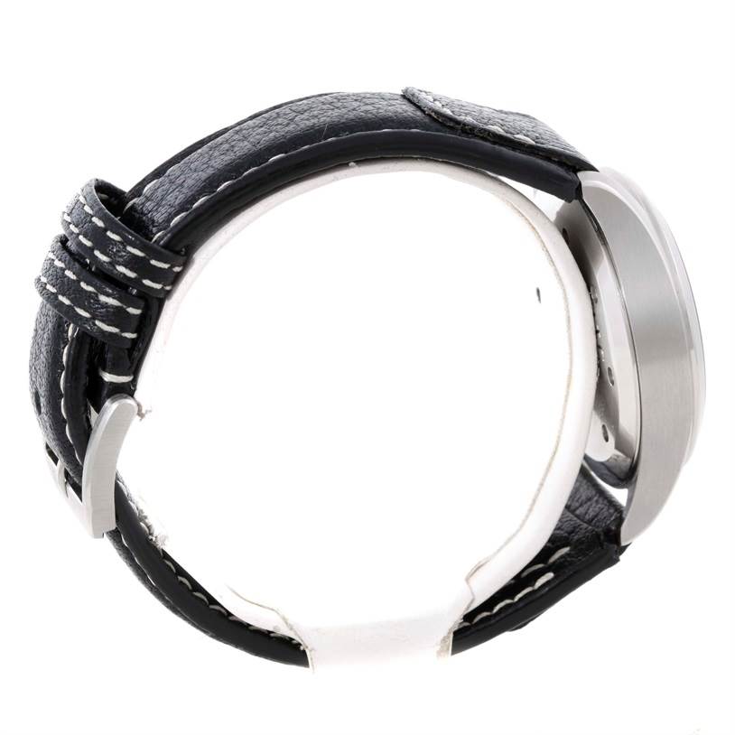 The image shows a side view of an IWC Pilot IW325101 Men's Stainless Steel Black Dial IW325101 Men's Stainless Steel Black Dial model watch, highlighting its leather strap and stainless steel case.