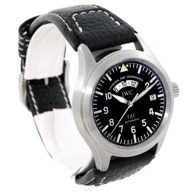 The IWC Pilot IW325101 Men's Stainless Steel Black Dial IW325101 Men's Stainless Steel Black Dial watch is shown at a three-quarter angle, highlighting its black dial, bezel, crown, and leather strap.