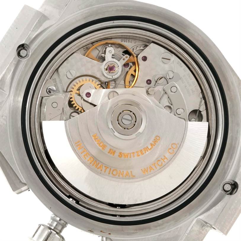 The image shows the back view of the IWC Ingenieur IW372501 Men's Stainless Steel Black Dial IW372501 Men's Stainless Steel Black Dial watch, revealing its internal movement and mechanism components.