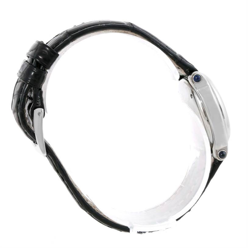 This side-angle view of the Chopard 27/8245-23 Women's Stainless Steel White Dial 27/8245-23 Women's Stainless Steel White Dial Happy Sport 27/8245-23 watch shows the case and leather strap from the side.