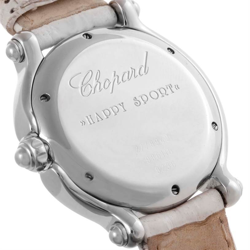 The image shows the back case and part of the strap of the Chopard 278949-3001 Women's Stainless Steel White Dial 278949-3001 Women's Stainless Steel White Dial Happy Sport Snowflake Floating Diamond Watch 278949-3001 model.