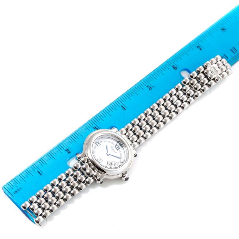 The image shows the top view of a Chopard 278236-3005 Women's Stainless Steel White Dial 278236-3005 Women's Stainless Steel White Dial Happy Sport White Dial Floating Diamond Watch 278236-3005, with a ruler for scale.